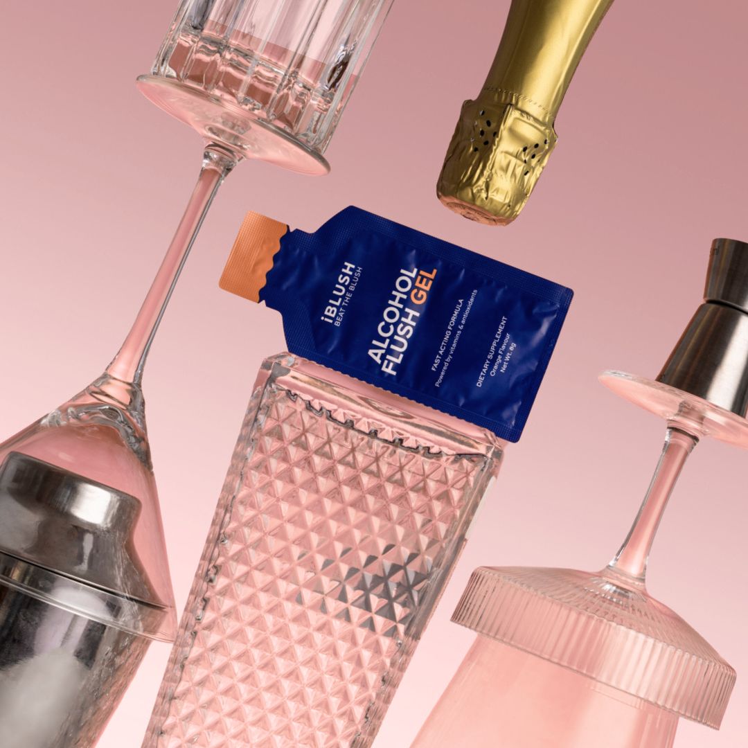 Alcohol flush gel packet with cocktail glasses on a pink background