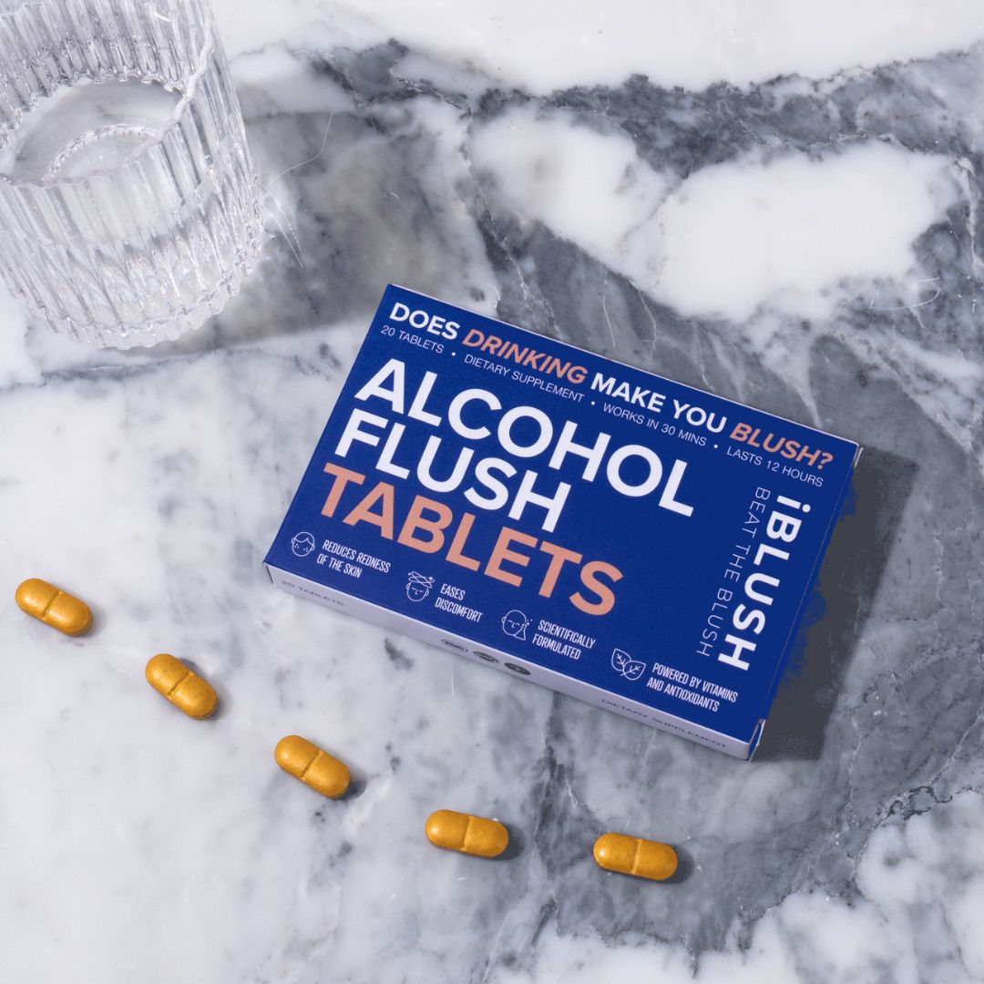 Box of Alcohol Flush Tablets on a marble surface with the alcohol flush pills around